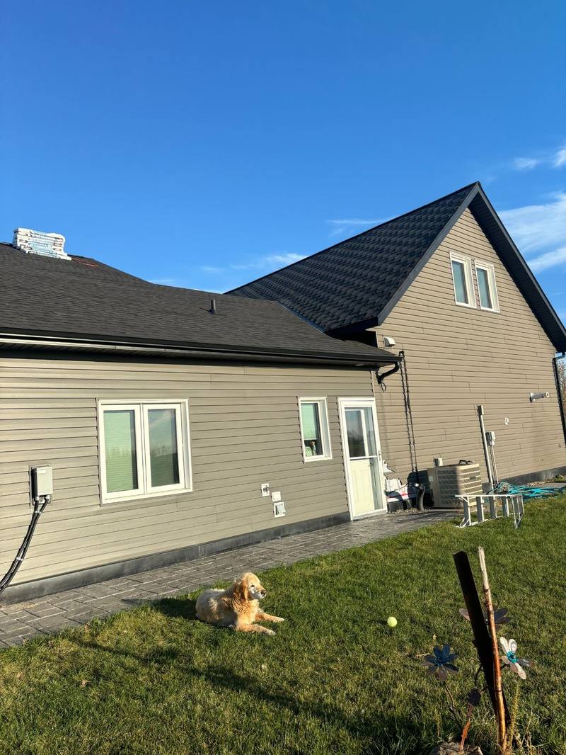 Completed roofing project on family home with new shingles by Molnar Roofing Yorkton SK