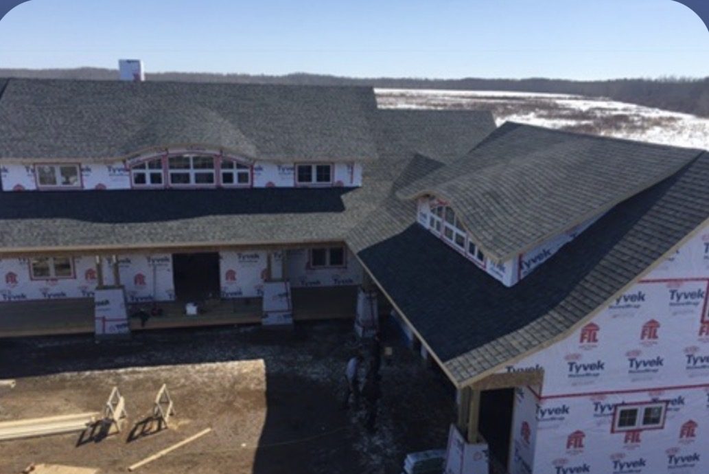 New construction roofing project aerial drone view by Molnar Roofing in Yorkton SK