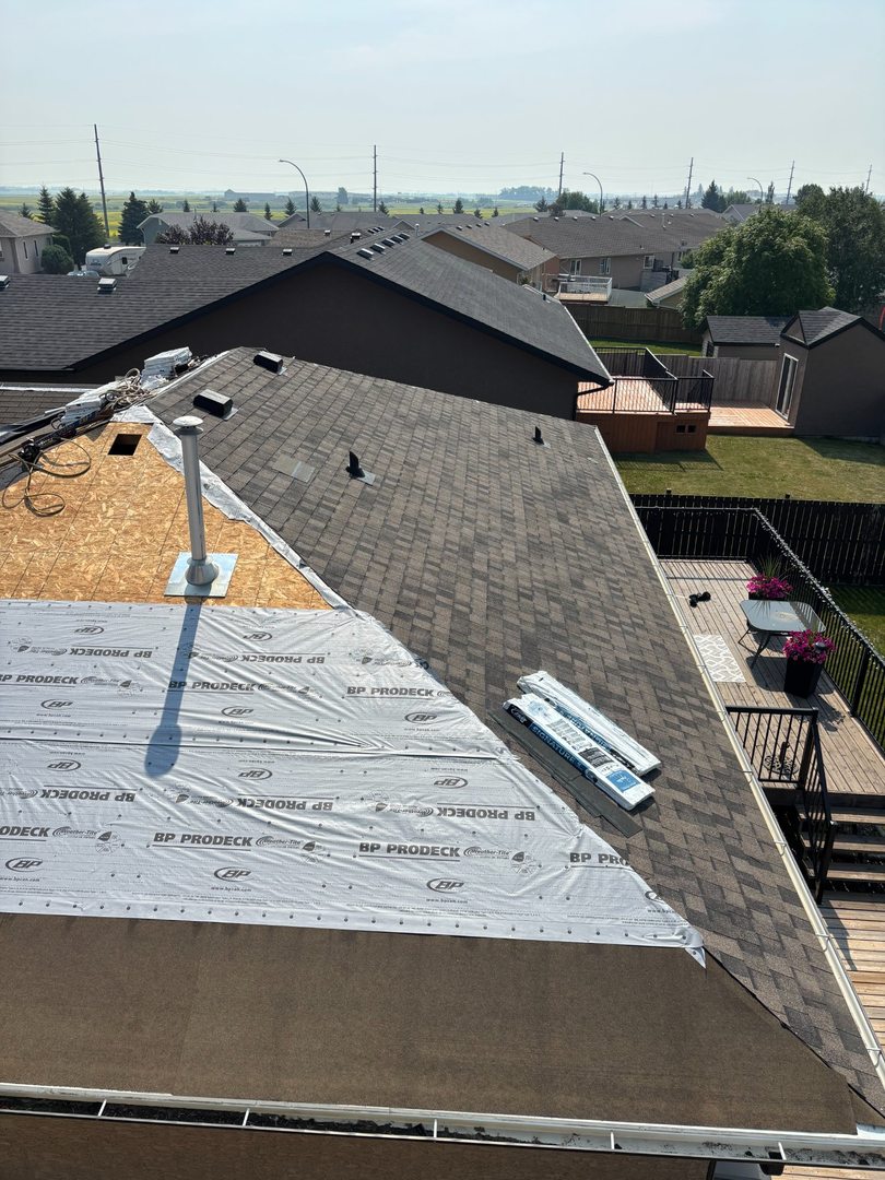 Roof replacement in progress for insurance claim showing BP ProDeck underlayment in Yorkton Saskatchewan