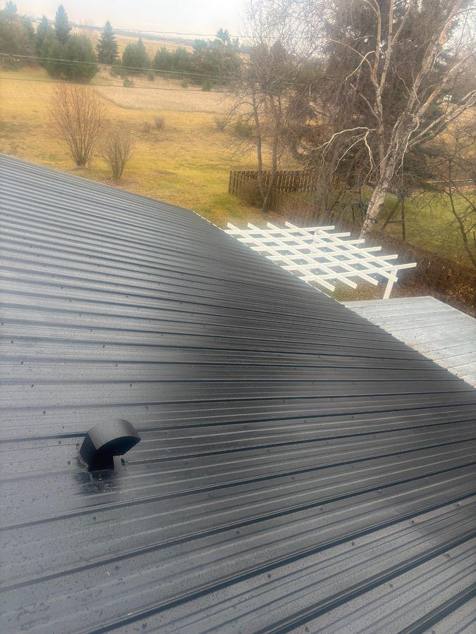 Metal roof detail showing vent and clean installation near Theodore Saskatchewan